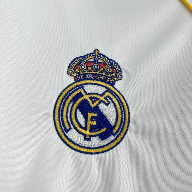 Camisa Real de Madrid I 25/26 - Torcedor Adidas Masculina - Branca com detalhes em cinza e amarelo