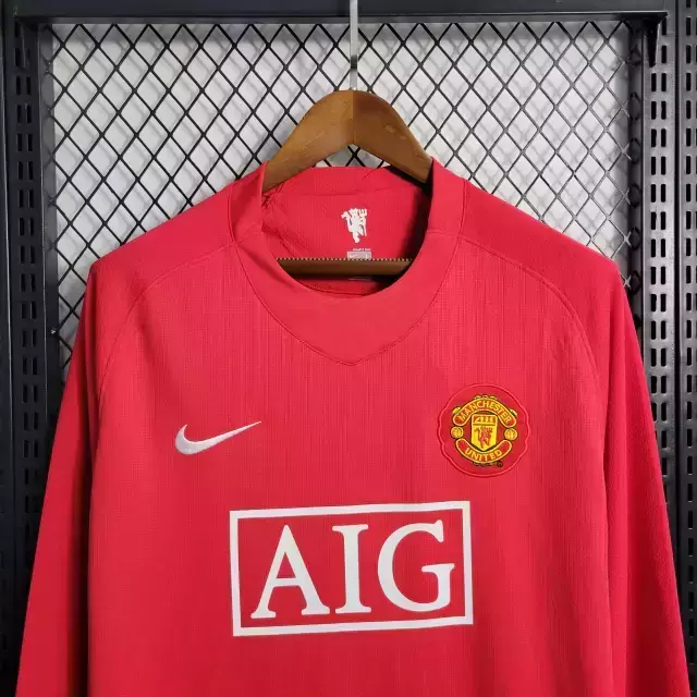 Manchester United kit infantil 08/09 manga longa