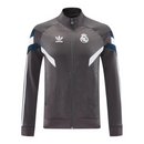 Jaqueta Corta-Vento Real Madrid 25/26 - Masculina Adidas - Cinza